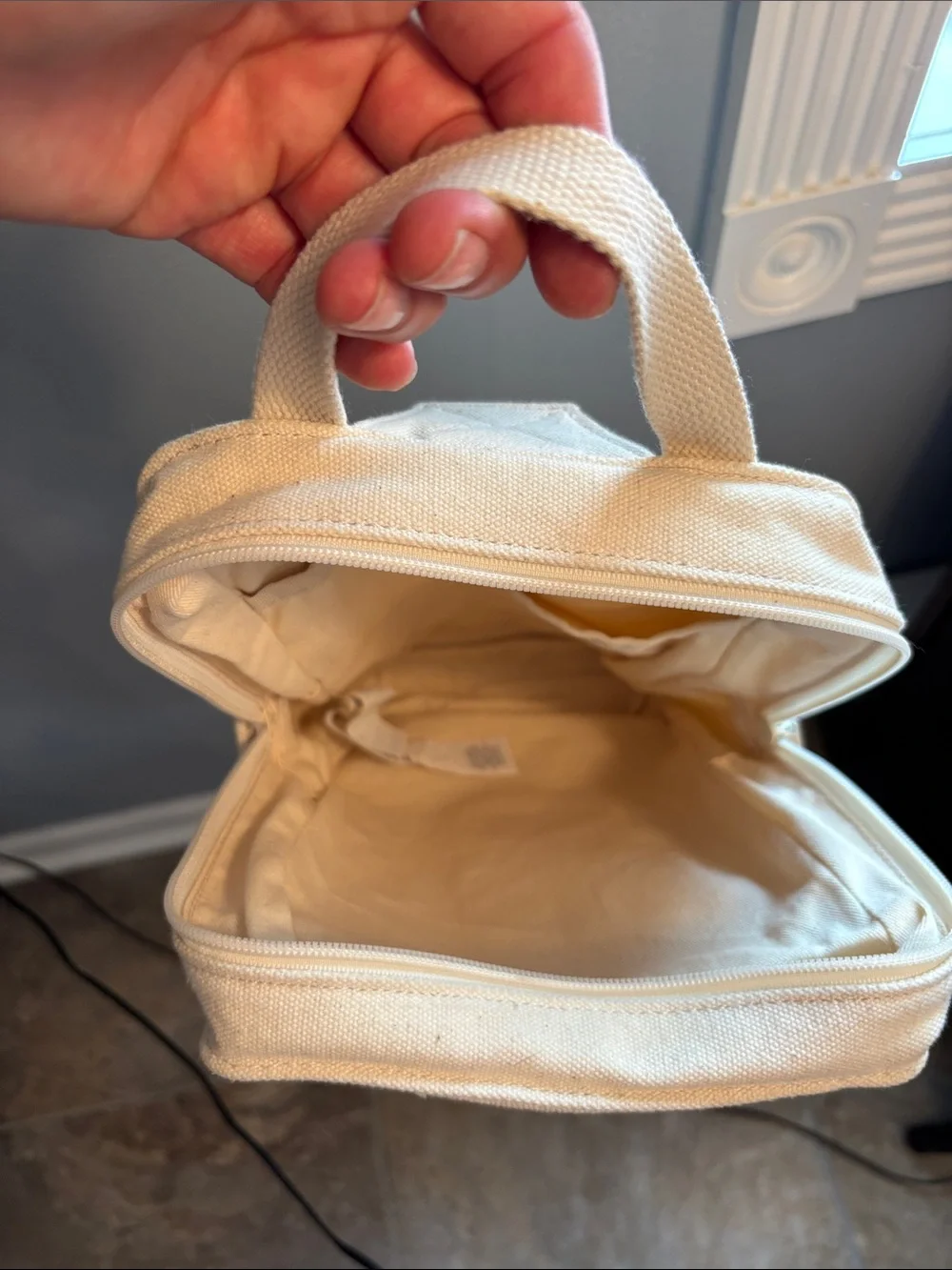 Levi's Cream Canvas Zip Sling Bag